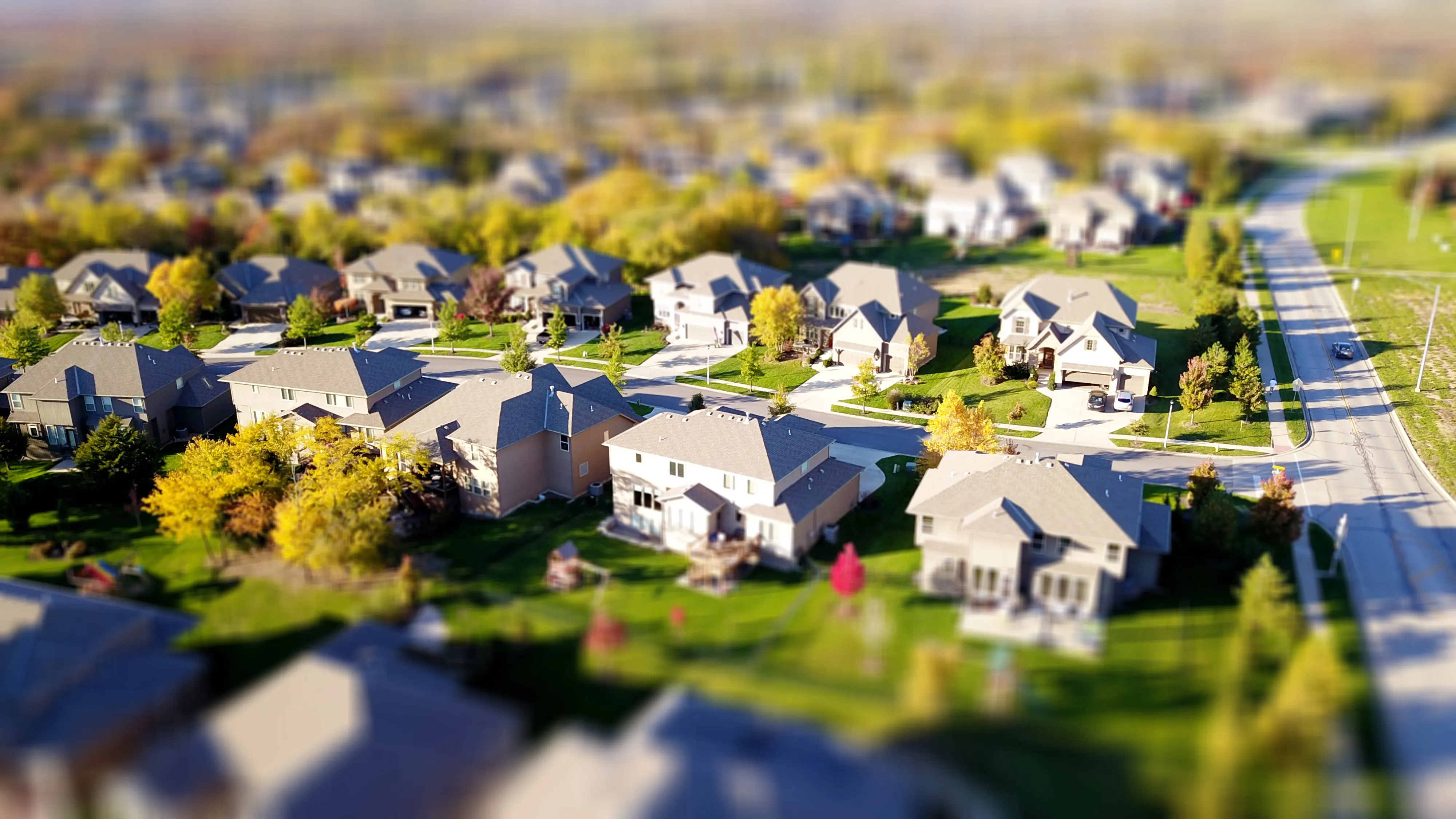 An aerial view of a residential neighborhood, representing Essex Property Trust apartment REIT