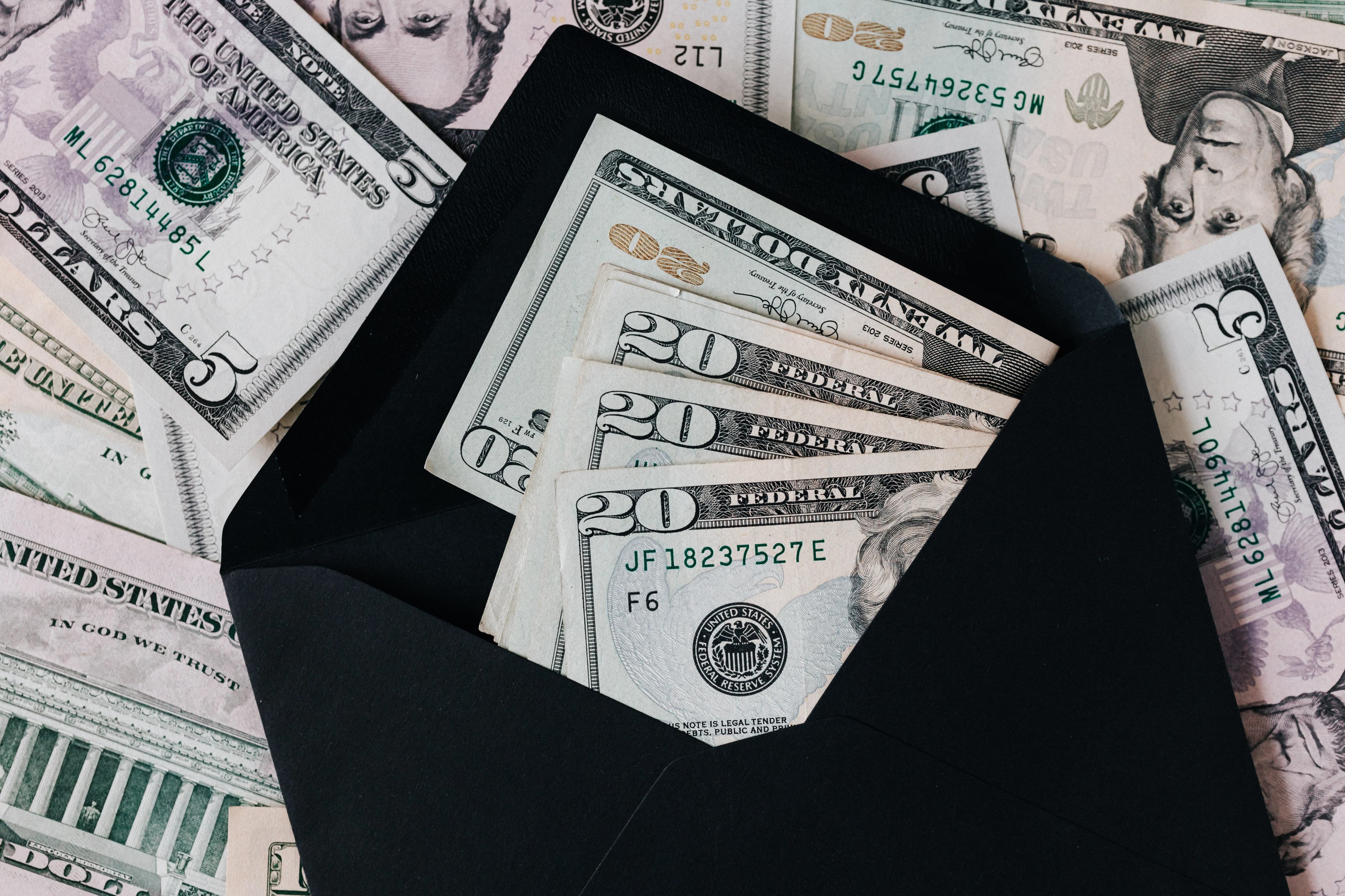US dollar bills and financial planning representing dividend income from stocks