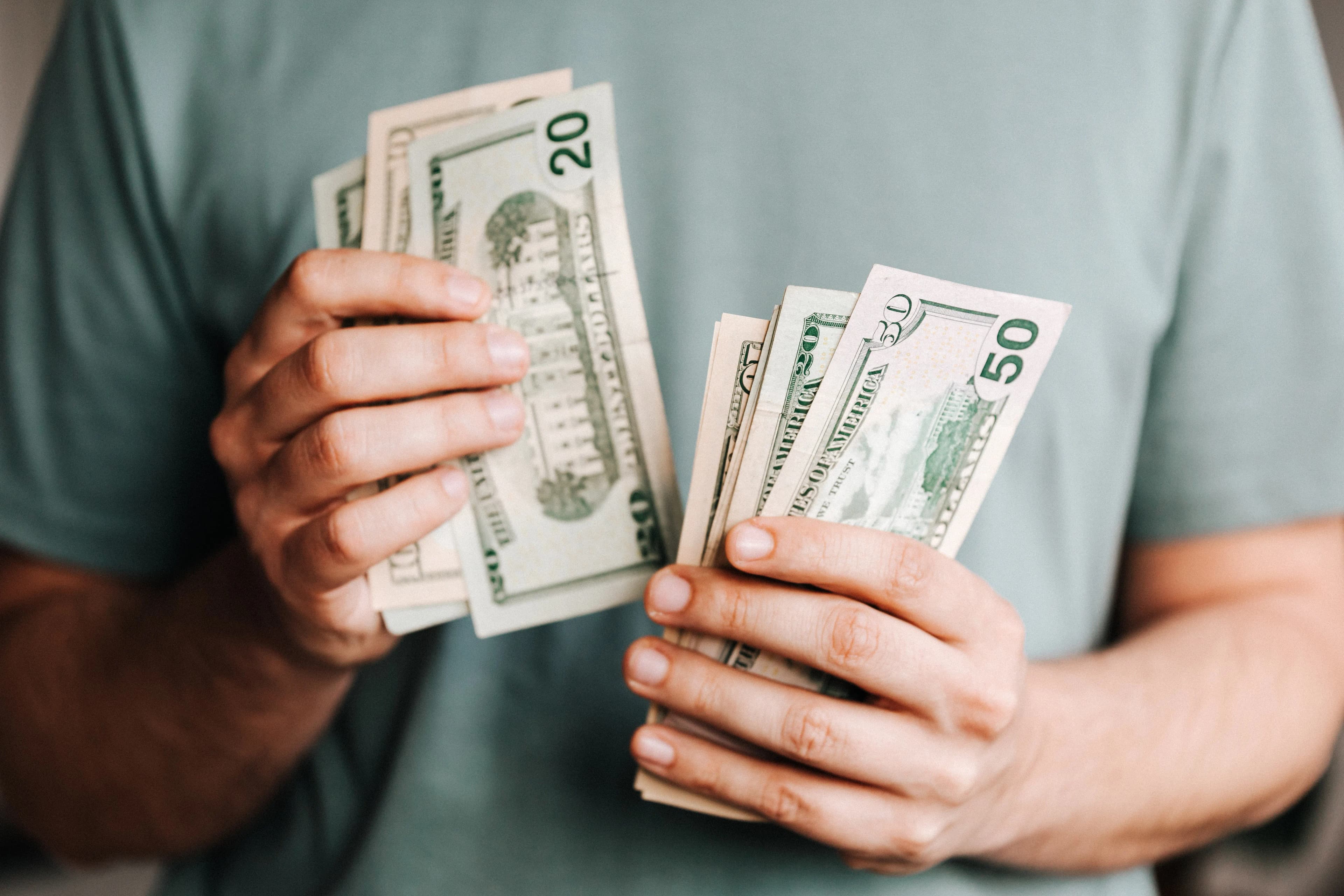 Investor reviewing bond yields and interest rates on financial documents