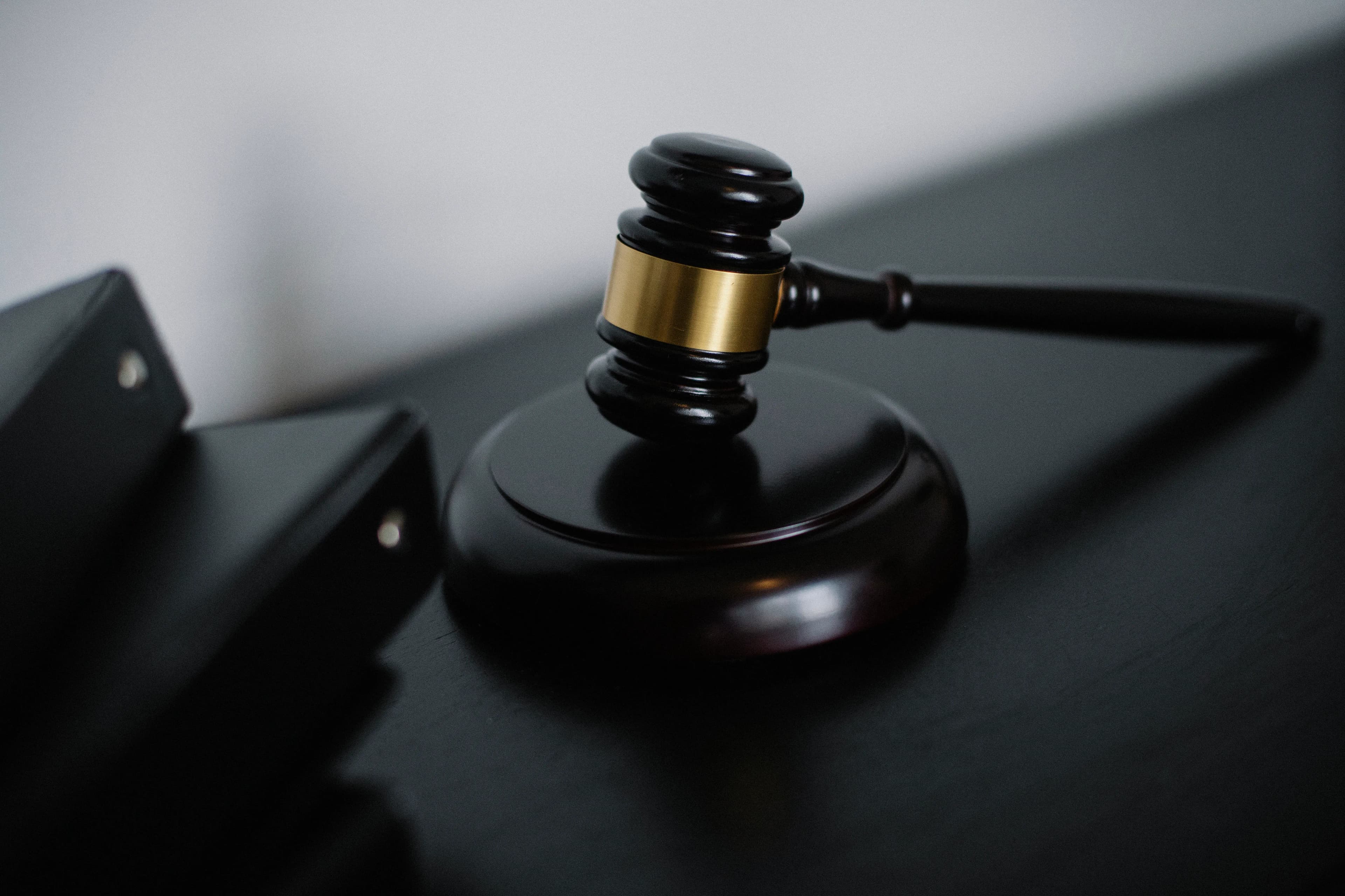 A wooden judge gavel, representing the US Senate vote on the CLARITY Act crypto regulation bill